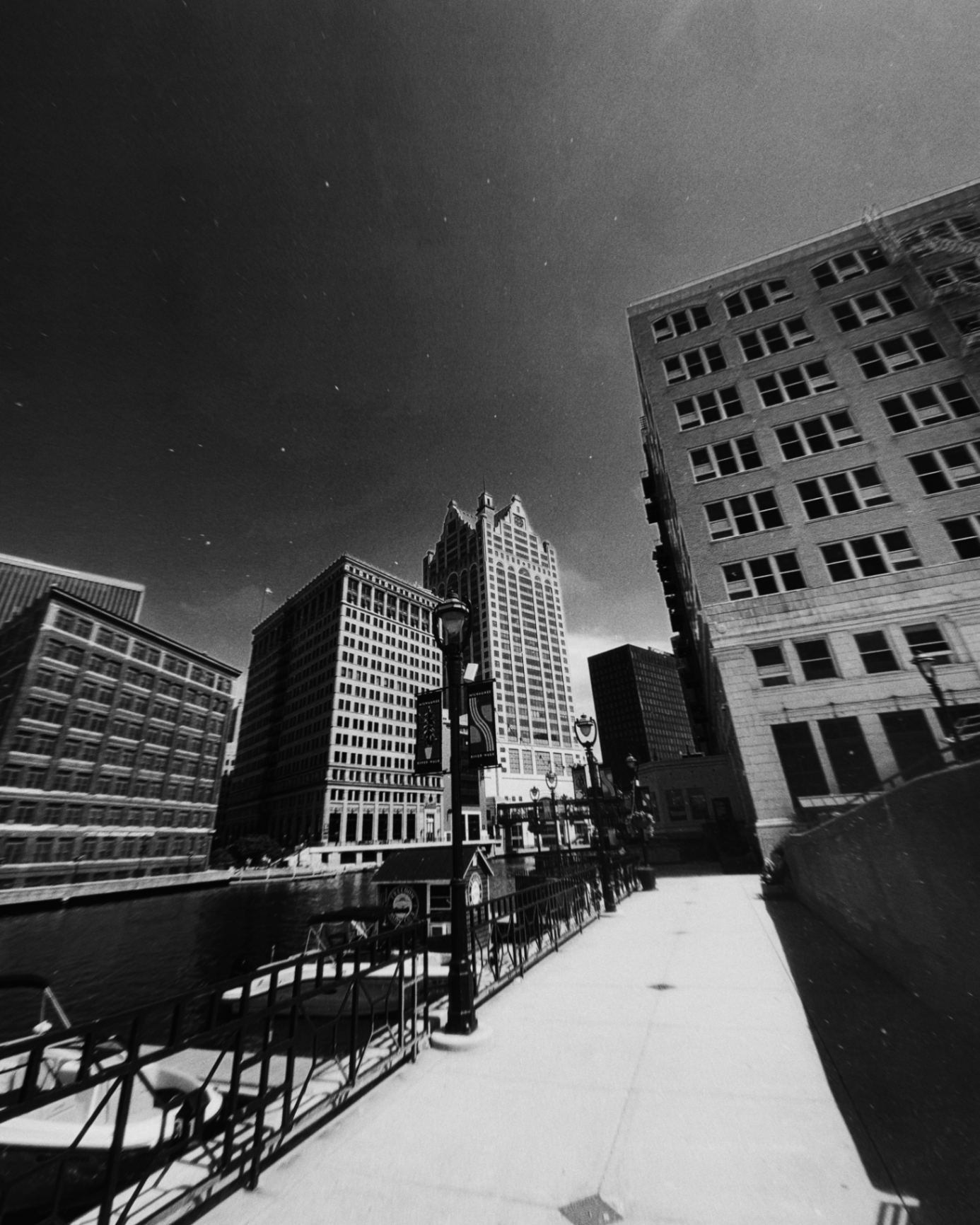 Milwaukee Riverwalk skyline in black and white